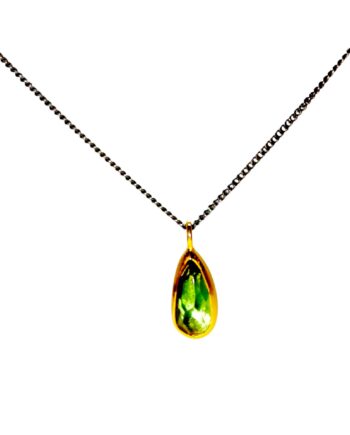 Motif with green tourmaline